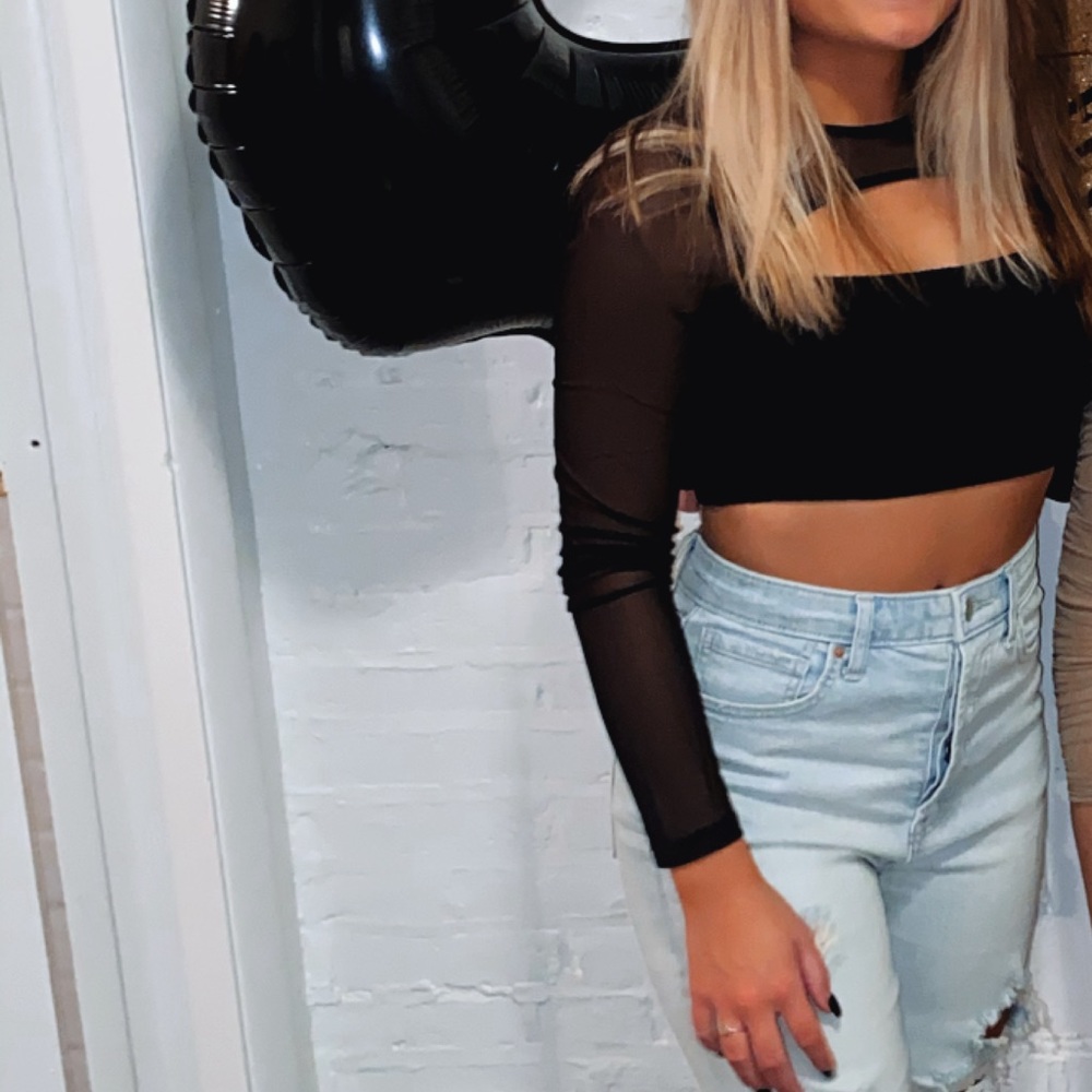Forever 21 mesh crop top with cut out. Brand on tag (didn’t come up in search)